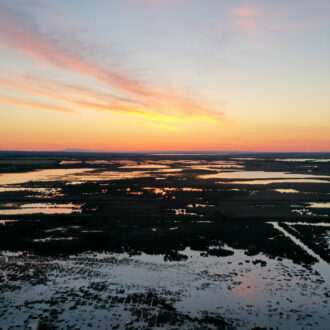 Coucher de soleil en bord de mer photographié par le drone Presta Div'Airs